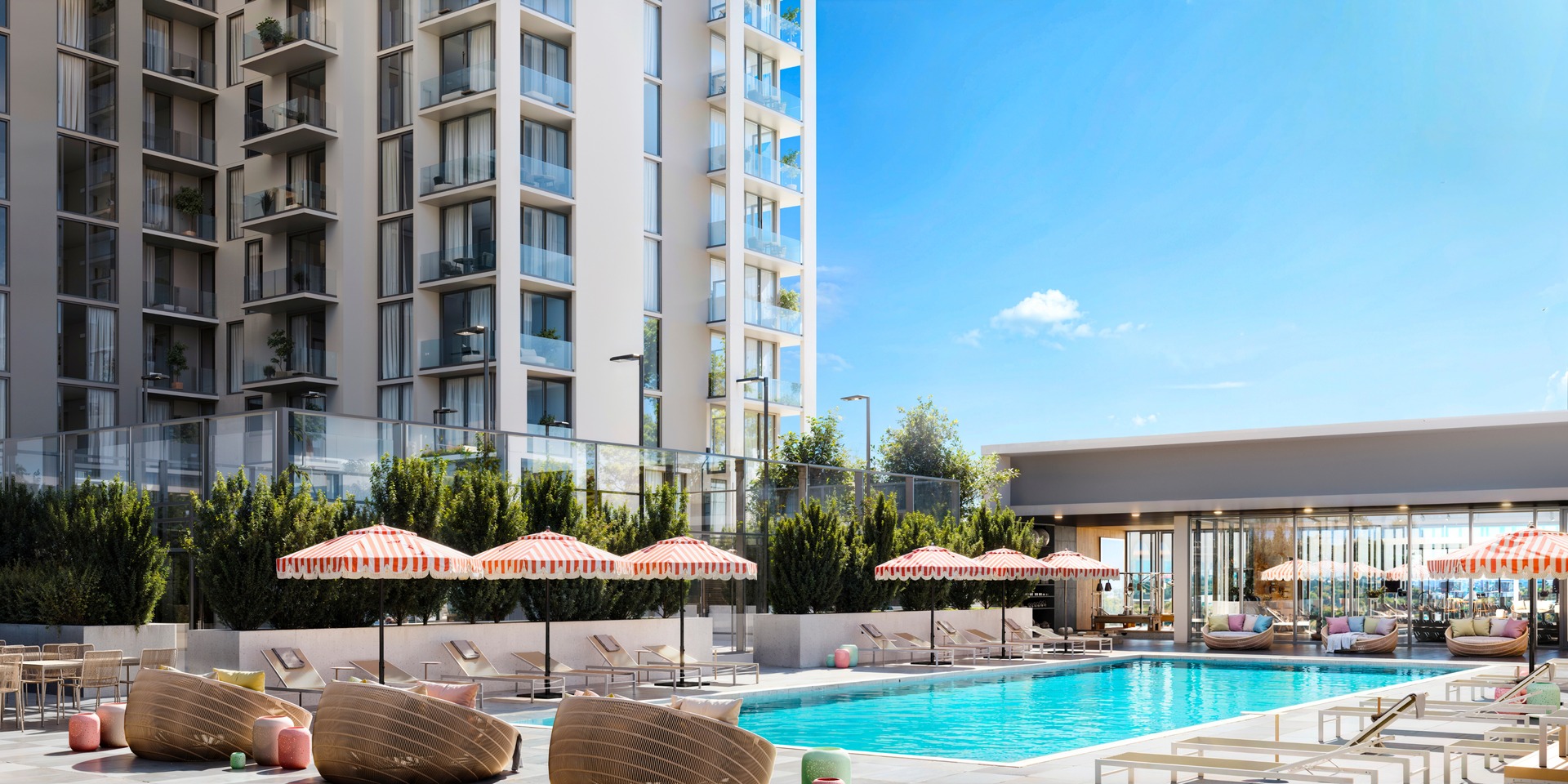 Sunbathing chair with umbrella by the swimming pool.